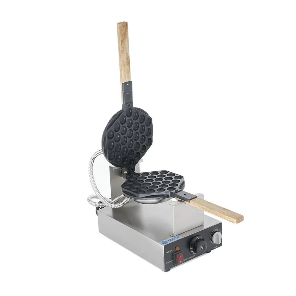 Wafflera de Burbuja Giratoria MIGSA HK-Q1 en acero inoxidable, con planchas de hierro fundido recubiertas de Teflón antiadherente. Sistema eléctrico giratorio, termostato ajustable, reloj temporizador de 5 minutos y foco piloto. Voltaje: 120V (clavija no incluida). Medidas: 31.4x30x20 cm, peso 3.7 kg